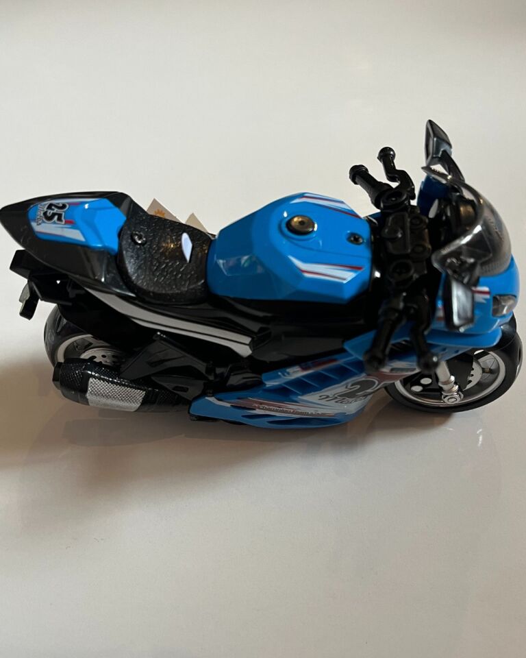 Oyuncak Motosiklet Şık Görünümlü Çek Bırak Işıklı ve Sesli Mavi 15 Cm - Mavi Su Dünyası